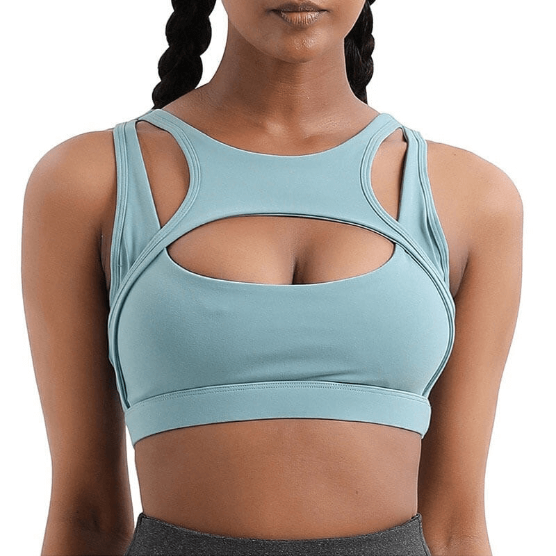 Athletic women's sports bra in blue, perfect for yoga and running, featuring breathable, quick-dry fabric with no zipper closure.